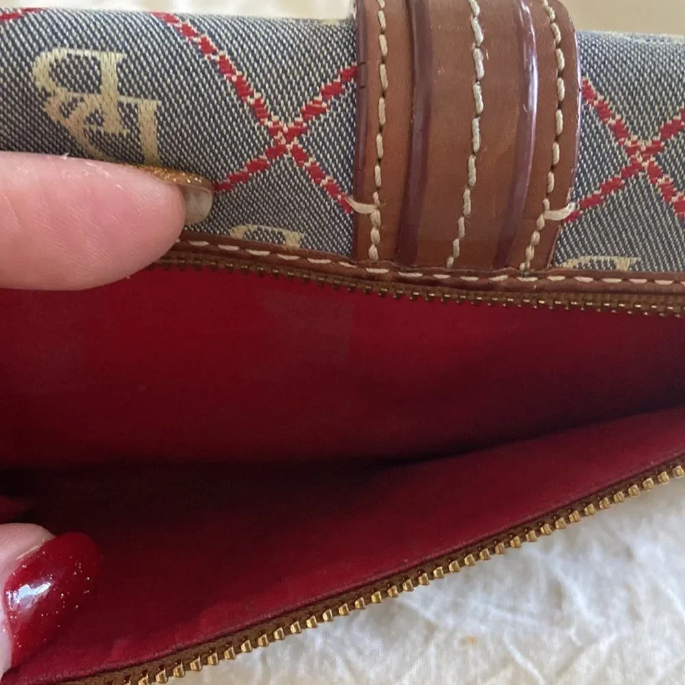 Dooney & Bourke Wallet Vintage leather clasp is silver leather imitation…